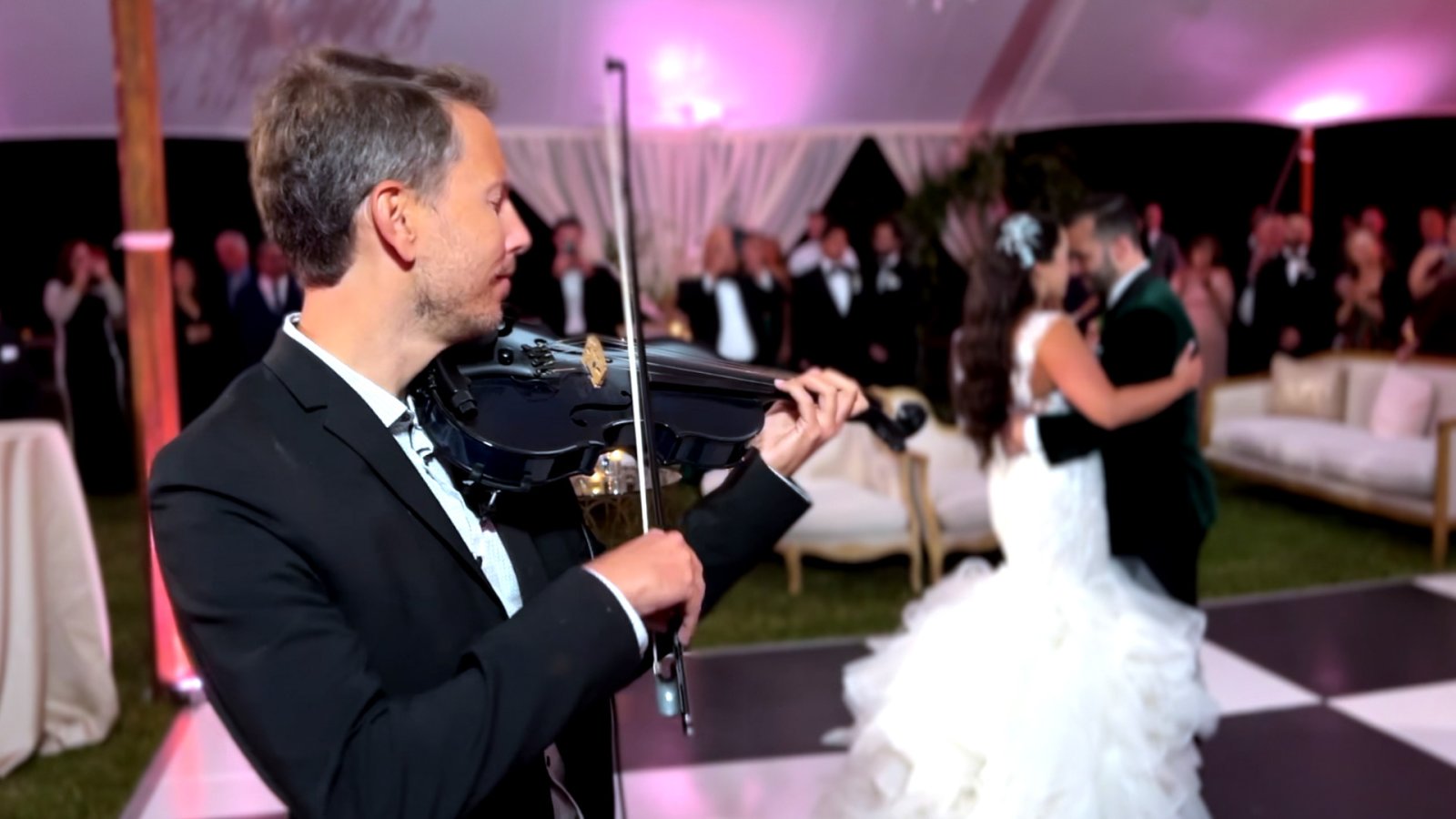 Mike W serenading bride and groom